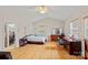 Spacious main bedroom featuring hardwood floors and a walk-in closet at 3830 Waters Reach Ln, Indian Trail, NC 28079