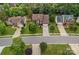 Street view of home in a neighborhood setting with mature trees and manicured lawns at 3830 Waters Reach Ln, Indian Trail, NC 28079