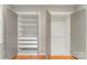 Spacious walk-in closet featuring custom shelving and ample storage space, offering organization and convenience at 4014 Sulkirk Rd, Charlotte, NC 28210