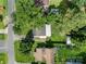 Overhead aerial view of the property featuring the house, yard, mature trees, and surrounding neighborhood at 405 E 18Th St, Kannapolis, NC 28083