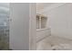 Unfinished basement featuring concrete walls and floors, offering potential for customization and additional storage at 405 E 18Th St, Kannapolis, NC 28083