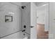 Renovated bathroom with tiled shower and modern fixtures at 405 E 18Th St, Kannapolis, NC 28083