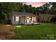 Charming single-story home featuring a welcoming front porch and shuttered windows at 405 E 18Th St, Kannapolis, NC 28083
