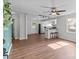 Open-concept living room with hardwood floors leading to the kitchen at 405 E 18Th St, Kannapolis, NC 28083