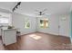 Open concept living room with breakfast bar and natural light at 405 E 18Th St, Kannapolis, NC 28083