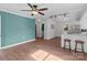 Open-concept living room with hardwood floors leading to the kitchen at 405 E 18Th St, Kannapolis, NC 28083