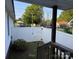 View from the back porch to the backyard through a white fence at 407 W Mill St, Landis, NC 28088