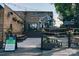 Outdoor seating area at Sugar Creek Brewery with murals and a relaxed atmosphere at 411 Devender Ne Ln # 5, Charlotte, NC 28217