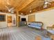 Relaxing outdoor patio with wood ceiling and comfortable seating at 5322 Bridgeview Dr, Iron Station, NC 28080