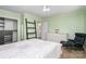 Bedroom with a large closet, light green paint and a bright window at 5742 Murrayhill Rd, Charlotte, NC 28210