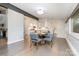Inviting dining room with hardwood floors and a fireplace view at 5742 Murrayhill Rd, Charlotte, NC 28210