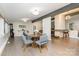 Versatile living space featuring hardwood floors and ample natural light at 5742 Murrayhill Rd, Charlotte, NC 28210