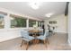 Versatile living space featuring hardwood floors and bright natural light at 5742 Murrayhill Rd, Charlotte, NC 28210