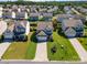 A quiet neighborhood featuring manicured lawns and mature trees in a Gathering-friendly community at 6156 Kilchurn Dr, Fort Mill, SC 29707