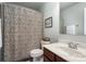 Bathroom with a shower and tub combination and decorative shower curtain at 6156 Kilchurn Dr, Fort Mill, SC 29707