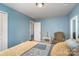 Cozy bedroom featuring a sitting area and neutral color scheme at 6156 Kilchurn Dr, Fort Mill, SC 29707