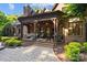 Expansive back porch showcasing outdoor living with brick accents and ample seating at 617 Beauhaven Ln, Waxhaw, NC 28173