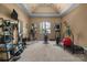 Well-lit home gym with ceiling detail and exercise equipment at 617 Beauhaven Ln, Waxhaw, NC 28173