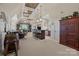 Finished basement with carpet, wet bar, and seating at 617 Beauhaven Ln, Waxhaw, NC 28173