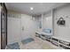 Inviting mudroom features storage cubbies, bench seating, and decorative accents at 617 Beauhaven Ln, Waxhaw, NC 28173