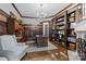 Wood-paneled office with custom built-ins and plenty of natural light at 617 Beauhaven Ln, Waxhaw, NC 28173