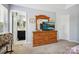 Bedroom features a wooden dresser and an ensuite bathroom at 7007 Creft Cir, Indian Trail, NC 28079