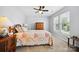 Bedroom featuring a ceiling fan, a double bed, and natural light from the windows at 7007 Creft Cir, Indian Trail, NC 28079