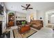 Spacious living room with a fireplace, hardwood flooring, and comfortable seating arrangement at 7007 Creft Cir, Indian Trail, NC 28079
