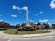 Town monument with obelisk, landscaping, and neighborhood homes under a bright sky at 7007 Creft Cir, Indian Trail, NC 28079