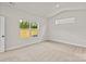 Bedroom with a large window, neutral carpet, vaulted ceiling, and natural light at 7311 Jerimoth Dr, Charlotte, NC 28215