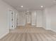 Spacious bonus room with plush carpeting, recessed lighting, and neutral-colored walls at 7311 Jerimoth Dr, Charlotte, NC 28215