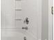 Close-up of a tiled shower with a chrome showerhead at 7315 Gasper Ln, Fort Mill, SC 29707