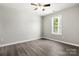 Bedroom with natural light and wood-look flooring at 7315 Gasper Ln, Fort Mill, SC 29707