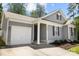 Charming home with gray siding, black shutters, and a one-car garage at 7315 Gasper Ln, Fort Mill, SC 29707