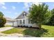 Charming home with gray siding, black shutters, and a well-manicured lawn at 7315 Gasper Ln, Fort Mill, SC 29707
