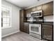 Well-lit kitchen featuring stainless steel appliances and plenty of cabinet space at 7315 Gasper Ln, Fort Mill, SC 29707