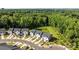An aerial view of the property in a neighborhood with mature trees and manicured lawns at 853 Gerard Bay Dr, Fort Mill, SC 29715