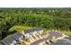 A stunning aerial of the property in a well-kept neighborhood close to nature, near a lush green landscape at 853 Gerard Bay Dr, Fort Mill, SC 29715