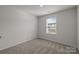 Neutral bedroom with carpet and a window at 853 Gerard Bay Dr, Fort Mill, SC 29715