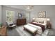 This bedroom is very large with lots of natural light at 853 Gerard Bay Dr, Fort Mill, SC 29715