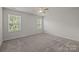 The bedroom features lots of natural light from the large windows at 853 Gerard Bay Dr, Fort Mill, SC 29715