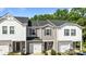 Charming townhome featuring a classic design and a well-manicured front yard at 853 Gerard Bay Dr, Fort Mill, SC 29715