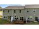 A backyard view of the property features a deck and sliding glass doors for access to the unit at 853 Gerard Bay Dr, Fort Mill, SC 29715