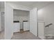 This laundry room is conveniently located upstairs at 853 Gerard Bay Dr, Fort Mill, SC 29715