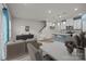 Staged living area with stylish furniture and decor complements a well-lit, open-concept space at 853 Gerard Bay Dr, Fort Mill, SC 29715