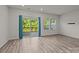 Bright living room with sliding glass doors leading to an outdoor deck and scenic view at 853 Gerard Bay Dr, Fort Mill, SC 29715