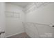 This walk-in closet features metal shelving at 853 Gerard Bay Dr, Fort Mill, SC 29715