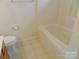 Bathroom featuring a toilet and bathtub at 10516 Pickerel Ln, Charlotte, NC 28213