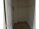 Walk-in closet with ample shelving at 10516 Pickerel Ln, Charlotte, NC 28213