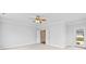 Neutral bedroom with carpet, fan and private outdoor access in addition to a door leading to living space at 112 Doyle Farm Ln, Mooresville, NC 28115